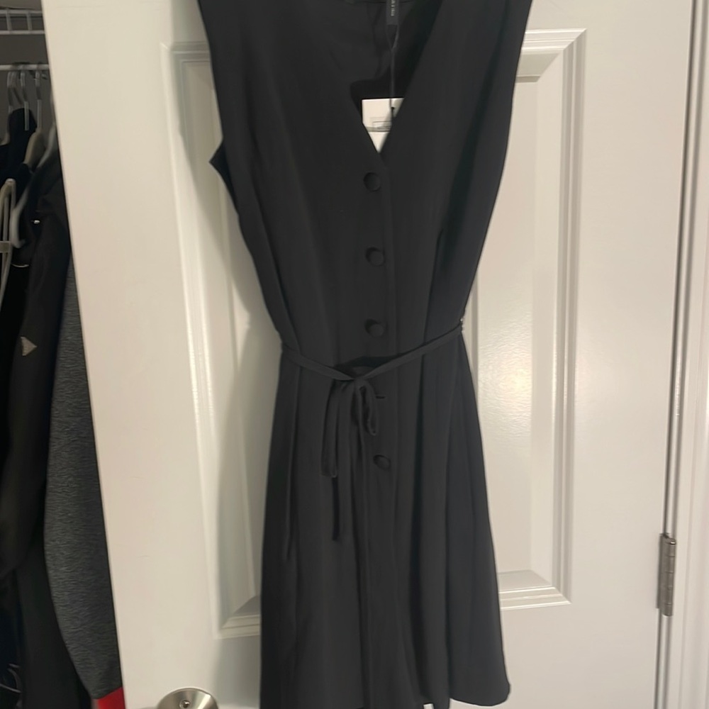 Theory black jumper never worn with tags . Size 2